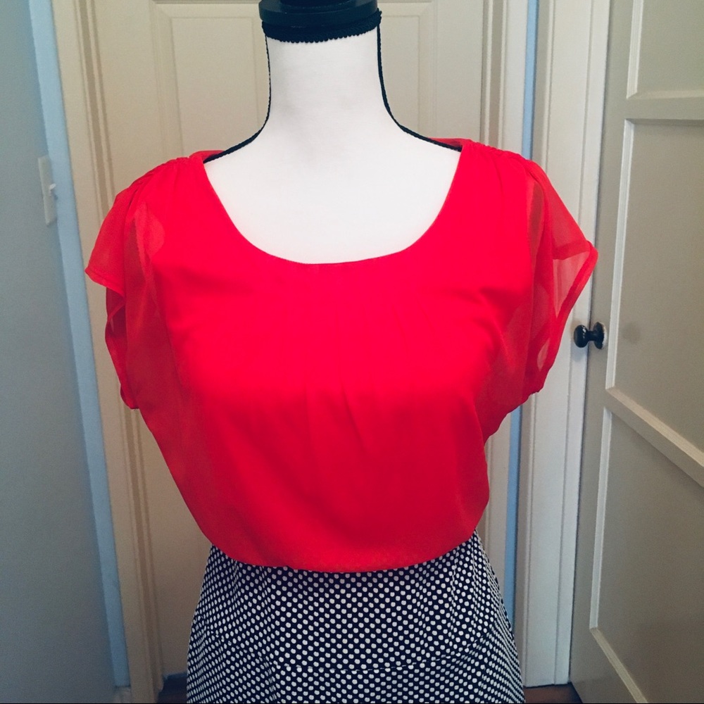 Two tones dress,  Burnt orange top, black & with dotted skirt